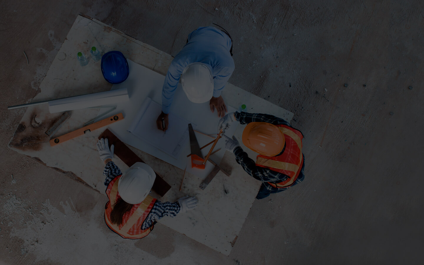 Birdseye view of a team of three on a construction site