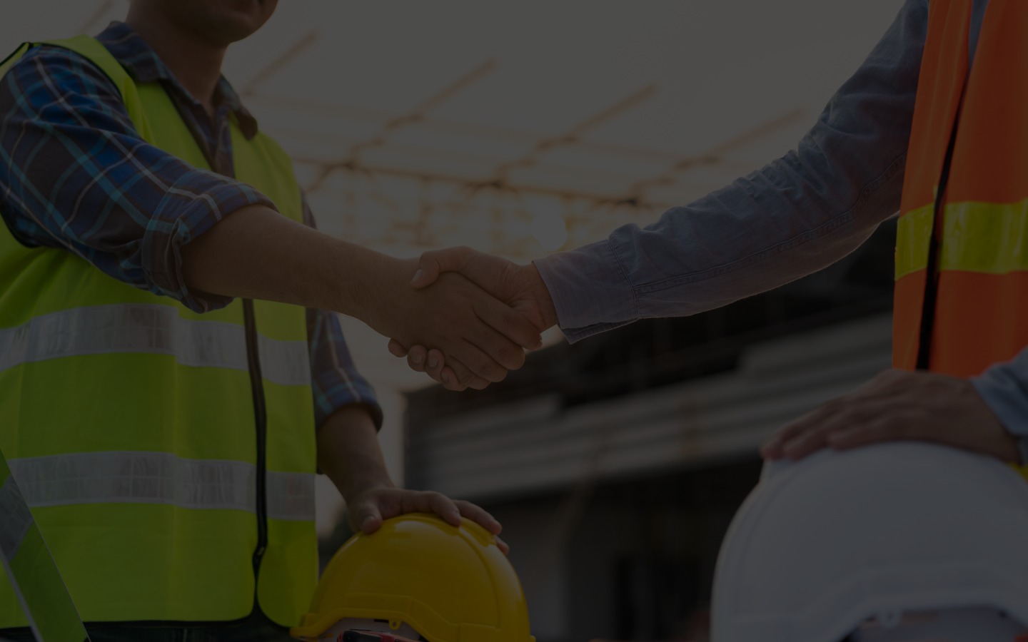 2 Building Construction Worker shaking hands 